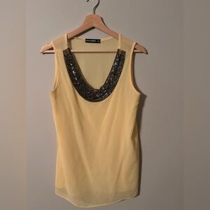 Pale yellow beaded scoop neck sleeveless top